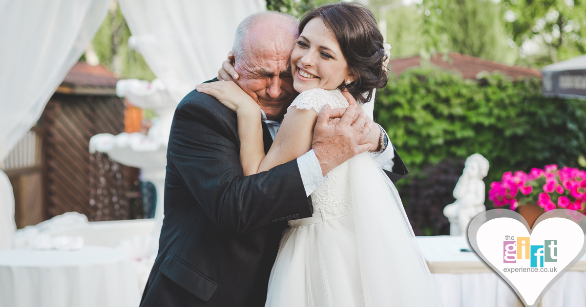 Bride hugging her dad on her wedding day