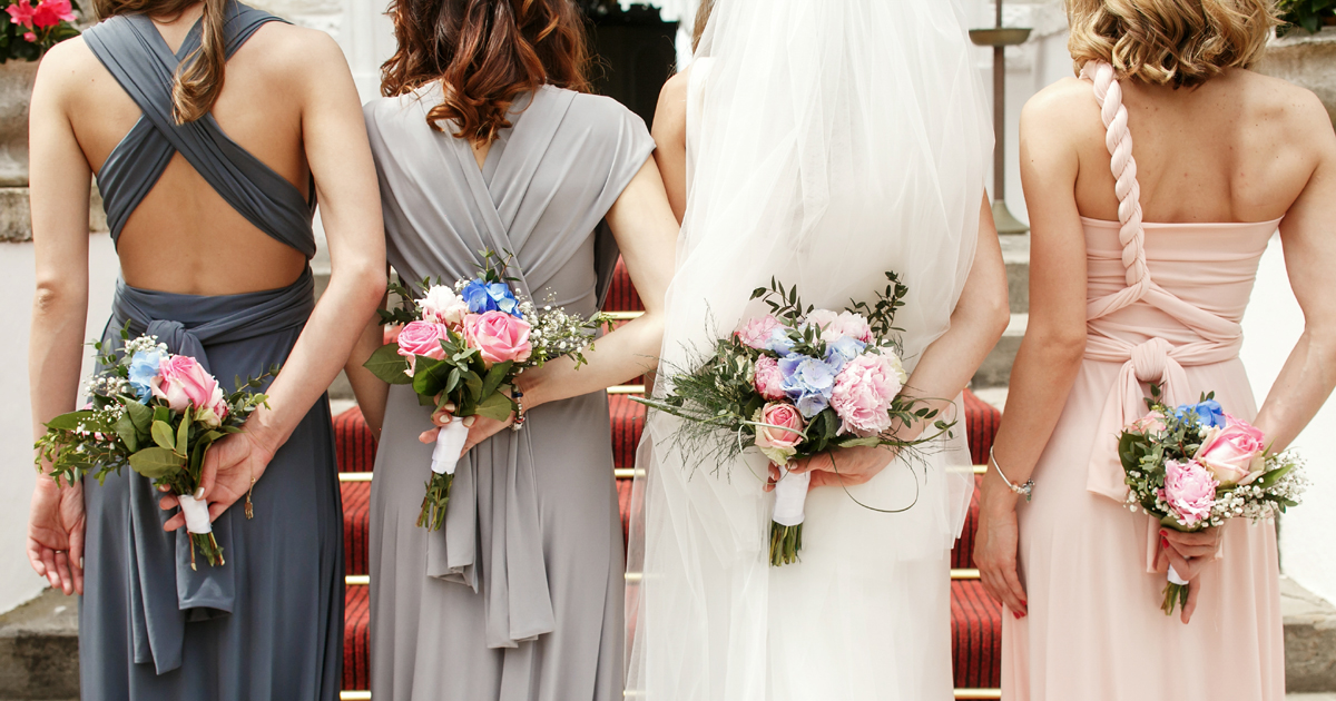 Bridesmaids in their mis-matched bridesmaid dresses