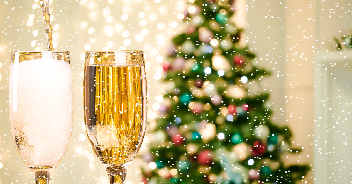 Champagne in front of a Christmas Tree