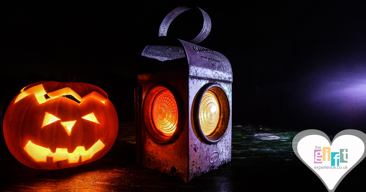 A pumpkin and a Halloween lantern