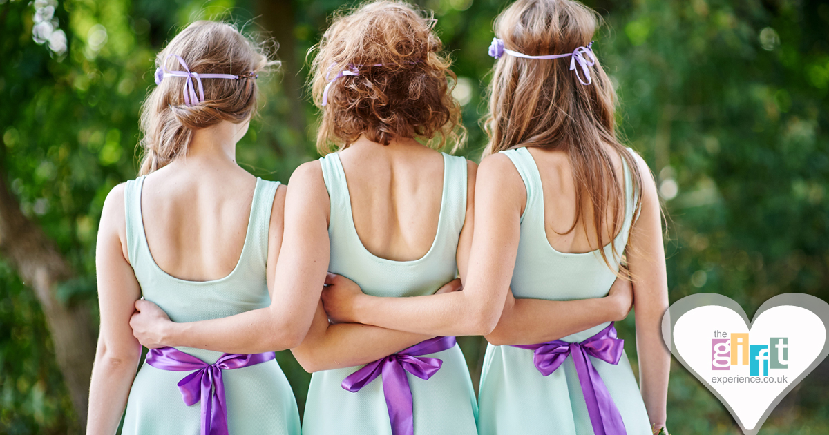 Three bridesmaids in matching wedding attire
